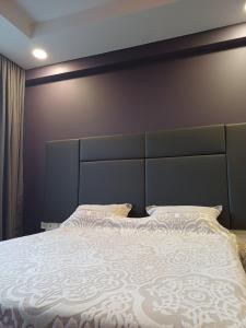 En eller flere senge i et værelse på Apartment green park