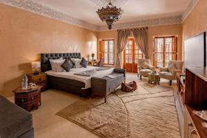 Postel nebo postele na pokoji v ubytování Riad Luciano Hotel and Spa