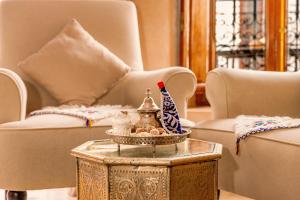 Posezení v ubytování Riad Luciano Hotel and Spa
