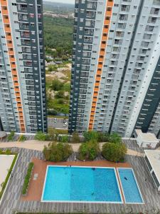 Kolam renang di atau dekat dengan D2303 Alanis Blessed Home Near KUL Airport +17 gambar
