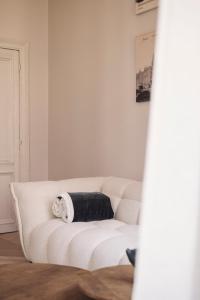 Letto o letti in una camera di Zurenborg Suites