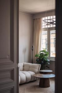 Area soggiorno di Zurenborg Suites