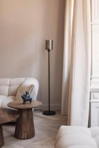 Area soggiorno di Zurenborg Suites