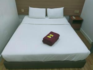 Postel nebo postele na pokoji v ubytování ESM Hotel