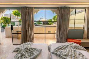 Posteľ alebo postele v izbe v ubytovaní Riad Luciano Hotel and Spa + 103 fotografií