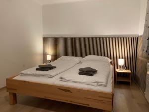 GO FOR MOUNTAINS Appartements房間的床