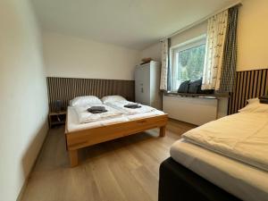 GO FOR MOUNTAINS Appartements房間的床