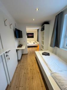 GO FOR MOUNTAINS Appartements房間的床