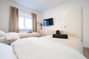 Postel nebo postele na pokoji v ubytování Luxury Zweibrücken Workers Rooms 2