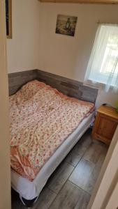 Postel nebo postele na pokoji v ubytování Sárközi Nyaraló