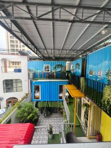 a view of a balcony with a blue wall at Phúc Đạt Container in Vung Tau