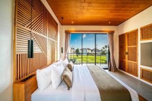 Ένα ή περισσότερα κρεβάτια σε δωμάτιο στο K Club Cemagi no 1 +50 φωτογραφίες