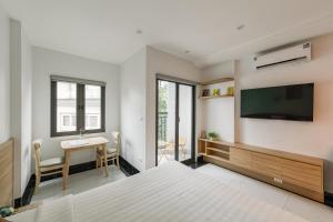 TV a/nebo společenská místnost v ubytování Dodo home AC