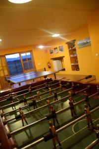 a group of people in a gymnasium at Masia d'Els Plans in Vidrá +130 photos