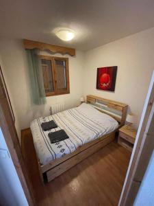 Postel nebo postele na pokoji v ubytování Orelle les 3 Vallées
