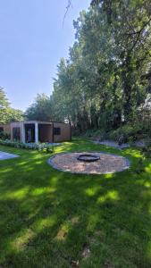 Zahrada ubytování NEW Tiny House Cinta- Dichtbij zee & in een groene omgeving