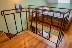 a metal bunk bed in a room at Alpine Retreat Maisonette in Bansko