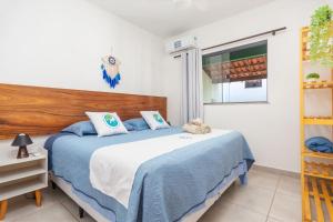 Postel nebo postele na pokoji v ubytování Arpoador Apts Praia & Piscina - Buzios Rentals
