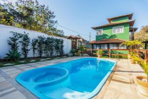 Bazén v ubytování Arpoador Apts Praia & Piscina - Buzios Rentals nebo v jeho okolí