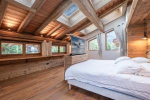 En eller flere senge i et værelse på Chalets ASA 426 m2