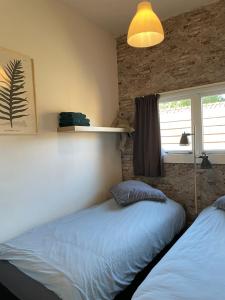 Postel nebo postele na pokoji v ubytování De Cel + 31 fotografií