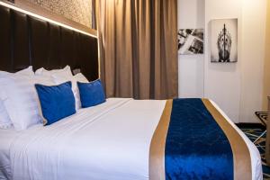 Ένα ή περισσότερα κρεβάτια σε δωμάτιο στο Taba Al Salam