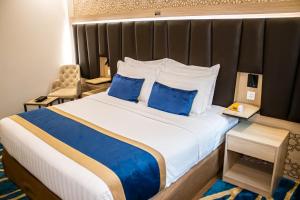 Ένα ή περισσότερα κρεβάτια σε δωμάτιο στο Taba Al Salam