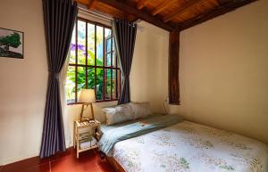 Postel nebo postele na pokoji v ubytování Moc Home Sapa + 37 fotografií