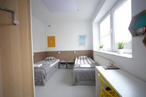 เตียงในห้องที่ Sport Hostel Chodakowska Warszawa