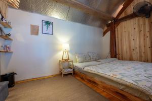 Postel nebo postele na pokoji v ubytování Moc Home Sapa