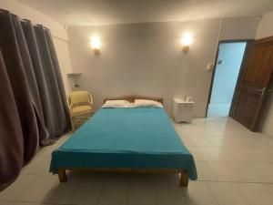 Postel nebo postele na pokoji v ubytování Residence Beach Azur