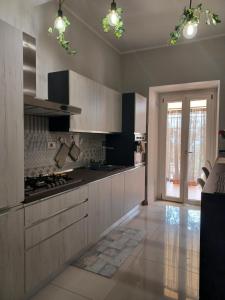 Kuchyň nebo kuchyňský kout v ubytování Casa Vacanze Borgo Garibaldi