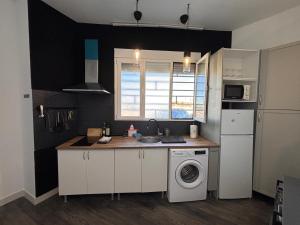 Η κουζίνα ή μικρή κουζίνα στο Pizarro 32 - I - A las puertas del campo talaverano