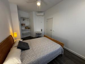 Ένα ή περισσότερα κρεβάτια σε δωμάτιο στο Pizarro 32 - I - A las puertas del campo talaverano