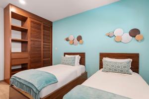 Postel nebo postele na pokoji v ubytování Malkita Sol Oceanview Paradise and Concierge Service
