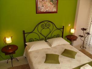 Postel nebo postele na pokoji v ubytování Garden Villa