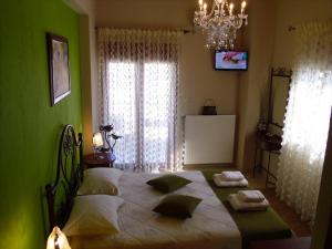Postel nebo postele na pokoji v ubytování Garden Villa
