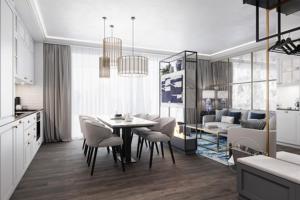 a kitchen and dining room with a table and chairs at Central Park Mielno Operator Team- apartament IVO in Mielno
