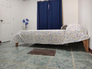 Voodi või voodid majutusasutuse Hostel Cora Chía toas