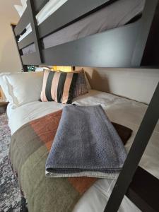 Voodi või voodid majutusasutuse Abbey Lodge toas