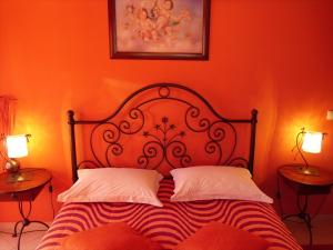 Postel nebo postele na pokoji v ubytování Garden Villa