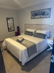 Ένα ή περισσότερα κρεβάτια σε δωμάτιο στο Chirute guest lodge