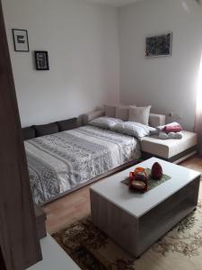 Postel nebo postele na pokoji v ubytování VILA NATALIJA APARTMANI