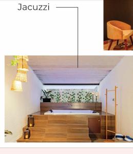 Habitación con bañera, mesa y silla en AmagoVillas, en Marna