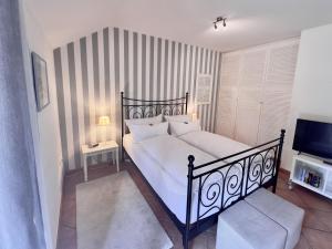 Postel nebo postele na pokoji v ubytování Gulfhof Butendiek - Groot Kostall