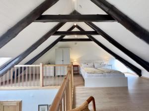 Postel nebo postele na pokoji v ubytování Gulfhof Butendiek - Früchtekammer