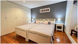 A bed or beds in a room at Casa Rural Xixa Landetxea
