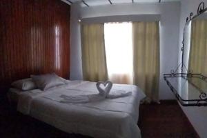 Postel nebo postele na pokoji v ubytování Tilarán home