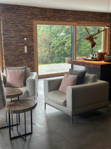 Posedenie v ubytovaní Pfändertraum Luxus Ferienhaus