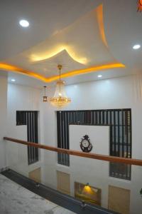 Φωτογραφία από το άλμπουμ του Luxurious 5000 SQFT Mansion with Modern Comforts And Spacious Elegance σε Malappuram